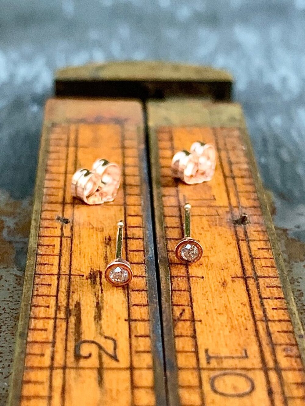 Gabriela Artigas baby bezel rose gold diamond earrings